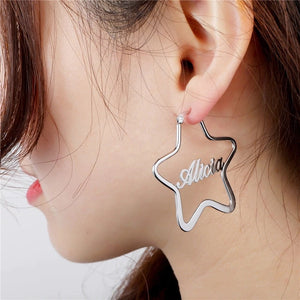 Personalized monogrammed nameplate hoop earrings, start shaped design. Example shows "Alicia". Buy in Silver, Gold or Rose Gold. Personalized monogrammed nameplate earrings are a great gift idea for women and teenaged girls, and are an inexpensive choice 